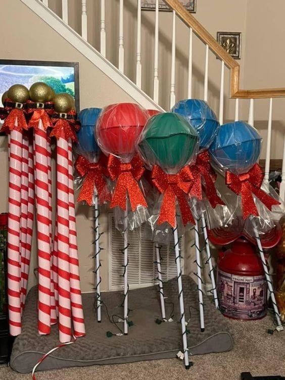 Create DIY Candy Cane Poles and Giant Lollipops for Christmas